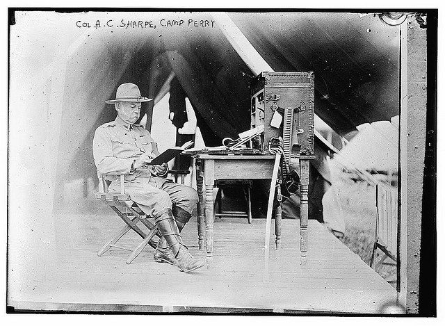 Col. AC Sharpe reading at Camp Perry. Library of Congress