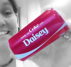 Daisey showing custom Coke can.